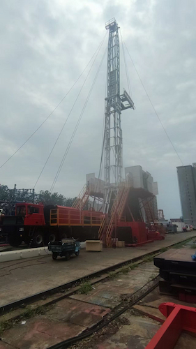 What is a truck-mounted workover rig?